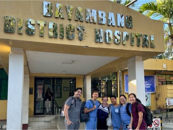 The team flew off to the Philippines on Jan 11 and arrived on Jan 13, gathering outside the hospital before their first volunteer shift.